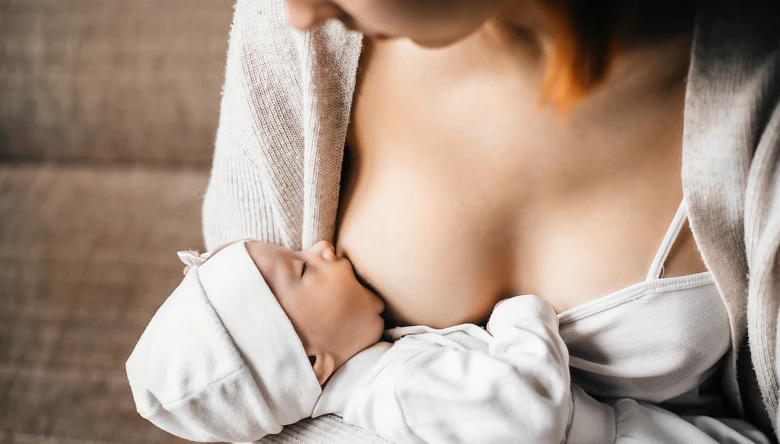 Mother breastfeeding baby