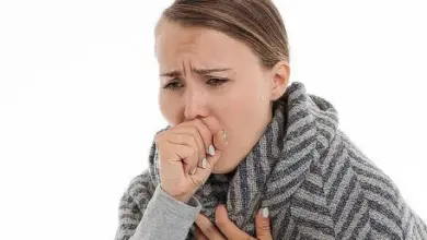 Woman coughing sick
